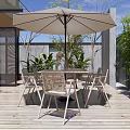 Modern Outdoor Dining Table And Chairs Set With Umbrella On Wooden Deck And Plants