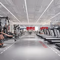 Spacious Modern Gym Interior With Treadmills Strength Training Machines And Bright Lighting
