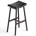 Sleek Modern Black Metal Bar Stool With Tall Sleek Frame For Kitchen Counter Space