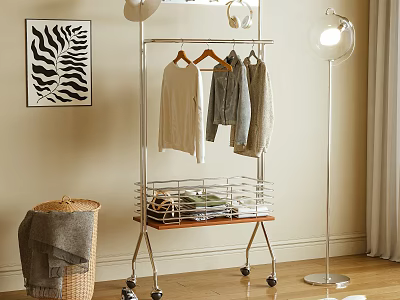 Metal Clothes Hanger with Wheels and Storage Shelf for Hanging Clothes in Modern Interior 3d model