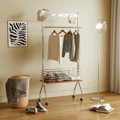 Metal Clothes Hanger with Wheels and Storage Shelf for Hanging Clothes in Modern Interior 3d model