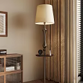 Modern Floor Lamp With Beige Shade In Interior With Wooden Cabinet And Curtains