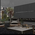 Residential Landscape Featuring Wicker Chairs Coffee Table Gravel Ground Trees Background Building And Illuminated Wall