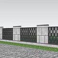 Building Exterior Wall with Gray Pillars Black Grilles Surrounded by Trees Grass on Gray Pavement