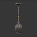 Decorative Metal Shovel With Green Red Accents And Ornate Handle Design