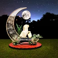 Decorative Crescent Moon Scene With Rabbit Sculpture Plants Flowers And Night Sky