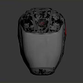 Futuristic Weapon Helmet Featuring Black Textured Surface And Red Decorative Accents