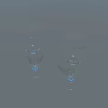 Two Transparent Glass Wine Glasses With Tall Stems On Gray Background