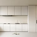Modern White Kitchen Interior Featuring Sleek Cabinets Countertop Stove And Oven