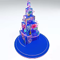Colorful Layered Decorative Tower With Blue Base And Pink Flower Accents