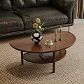Oval Brown Coffee Table With Vase Teacup Candles And Sofa Rug 3d model