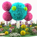 Colorful Garden Featuring Fluffy Blue Pink Blooms Green Centers White Trunk And Various Flowers