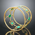 Gold Circular Jewelry With Intricate Openwork Design And Green Gemstone Inlays