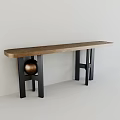 Long Wooden Dining Table With Black Legs Golden Ball Decoration Against White Wall