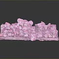 Pile Of Broken Ceramic Fragments With Pink And White Patterns And Small Green Object