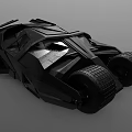 Powerful Black Batmobile Featuring Angular Design Large Tires And Futuristic Movie Style