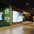 Cinema Lobby Interior Design With Tickets Concession Counter Seating Area Green Yellow Decorative Chandeliers