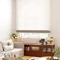 White Window Blinds In Bright Living Room With Green Outdoor View