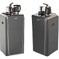 Two Black Floor Standing Water Dispensers With Gold Kettles On Top