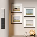Four Framed Minimalist Landscape Paintings Hanging On Wall With Grass Sky