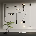 Modern Black Wall Lamps With Geometric Design In Interior Setting And Green Plant