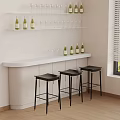 White Bar Counter With Black Stools Wine Bottles And Glasses On Shelf
