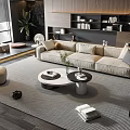 Modern Living Room Interior Beige Sofa And Round Coffee Table Set On Area Rug With Bookshelf