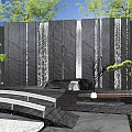 Serene Black Stone Feature Wall With Waterfall Pine Trees And Arch Bridge