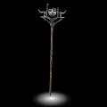 Ancient Decorative Weapon With Long Intricate Metal Handle And Ornate Top Structure