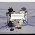 Vintage Oil Lamps In Black And Silver Design With Matchsticks And Matchboxes
