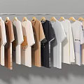 Clothes Hanging on Hangers with Various Styles and Colors in Two Rows Against Gray Background