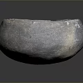 Ancient Hand Carved Clay Sculpture Bowl With Rough Textured Surface And Earthy Tone