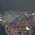 Cliffside Traditional Style Boutique Hotel Buildings Surrounded By Forest Green Lawn And Purple Flowering Trees