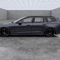 Dark Blue Volvo Estate Car With Sleek Design And Black Alloy Wheels