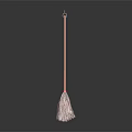 Colorful Broom With Wooden Handle Metal Ring And Striped Bristles On Dark Background
