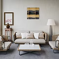 Modern Living Room Interior With Sofa Rattan Chairs Coffee Table Decorative Painting And Floor Lamp
