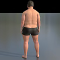 Game And Movie Male Character Shirtless In Black Shorts Standing Pose