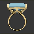 Elegant Gold Ring With Blue Green Gemstone Inlaid Design And Shiny Surface