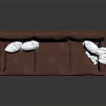 Modern Brown Leather Three-Seater Sofa with White Cushions and Blanket on Metal Legs