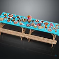 Assorted Foods Cakes Desserts and Fruits on Blue Tablecloth Long Table with Benches