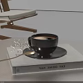 Black Coffee Cup on EAT DRINK NAP Book with Golden Spoon and White Baby's Breath