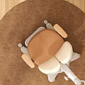 Ergonomic Modern Single Chair With Beige Padded Back Brown Seat And Wheels On Wooden Floor