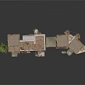 Traditional Stone Building With Connected Structures And Sloped Roofs Near Small Tree