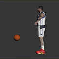 Man With Tattoos Wearing Dallas Mavericks Jersey Number 3 Standing With Basketball And Red Shoes