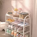 White Multi tier Shoe Rack with Slippers Sneakers Decorative Dolls Wicker Basket and Green Plants