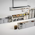 Modern Commercial Kitchen With Stainless Steel Cabinets Display Cases And Appliances