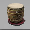 Traditional Decorative Drum with White Drumhead Golden Edges Intricate Patterns on Red Cushioned Base