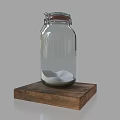 Stylish Magazine Publication Display With Clear Glass Jar And White Sand On Wooden Stand