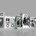 Modern Fashion Display Area With Mannequins Pictures And Glass Cabinets