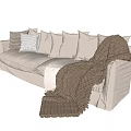 Cozy Beige Fabric Multi Seat Sofa With Plush Pillows And Knitted Blanket